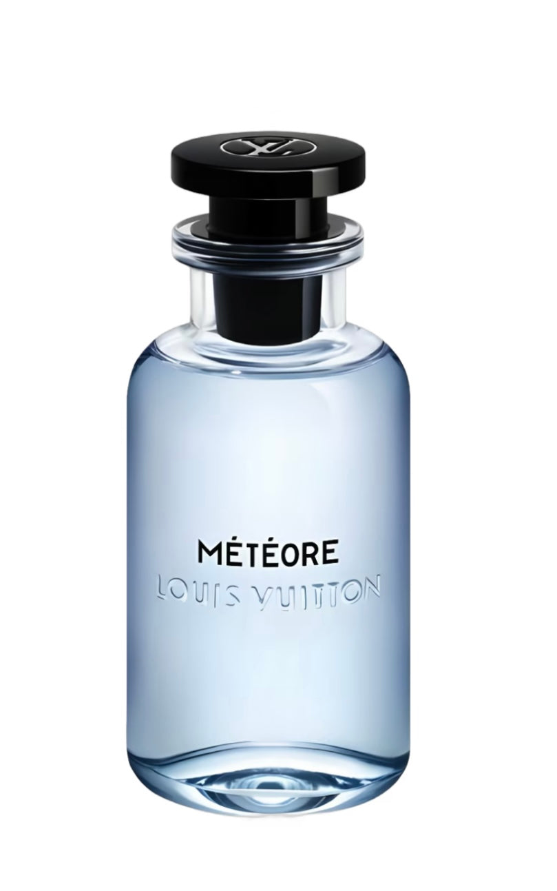 Pale blue Louis Vuitton Météore perfume bottle with a black cap on a white background.
